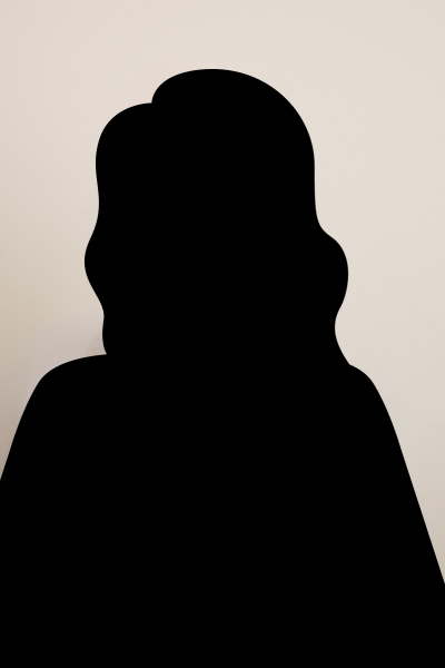Headshot silhouette of woman with long hair.