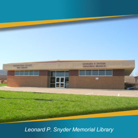 Leonard P. Snyder Memorial Library building with grass in front and blue sky behind.