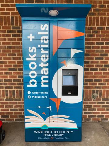 Photo of North Point electronic book locker; text on machine books + materials