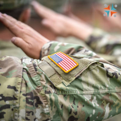 Army personnel saluting from behind with the WCFL logo in the right upper corner