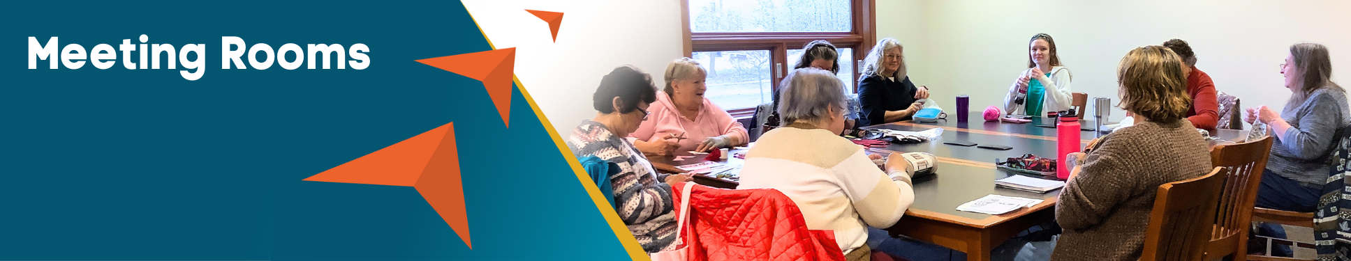 Meeting Rooms banner with three orange arrows pointing to image of adults sitting around a table doing crafts.